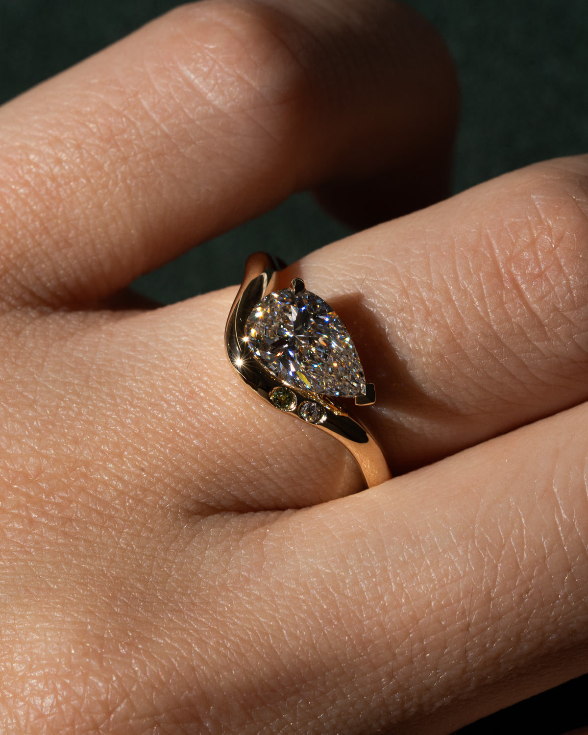 Freeform pear with peridot and diamond accents