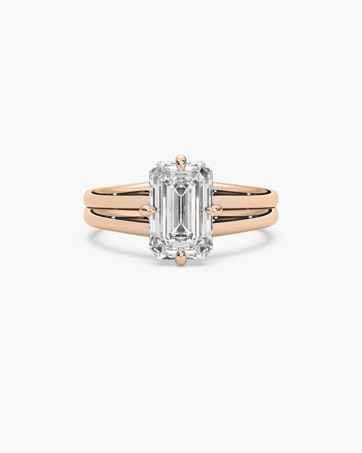 Sen Ribbed emerald cut solitaire engagement ring in 18k rose gold, top view