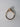 Side view of marquise diamond engagement ring showing cathedral setting and pavé diamond band in yellow gold