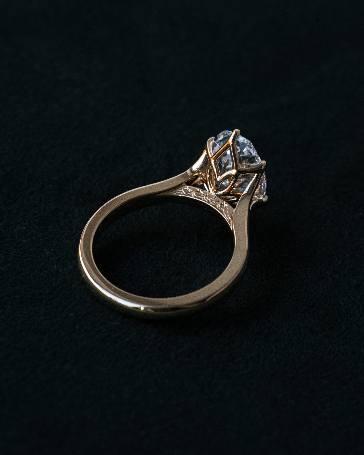 Oval diamond with hidden mountain engraving