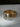 Modern gold wedding band with green emerald inlay and satin brushed finish