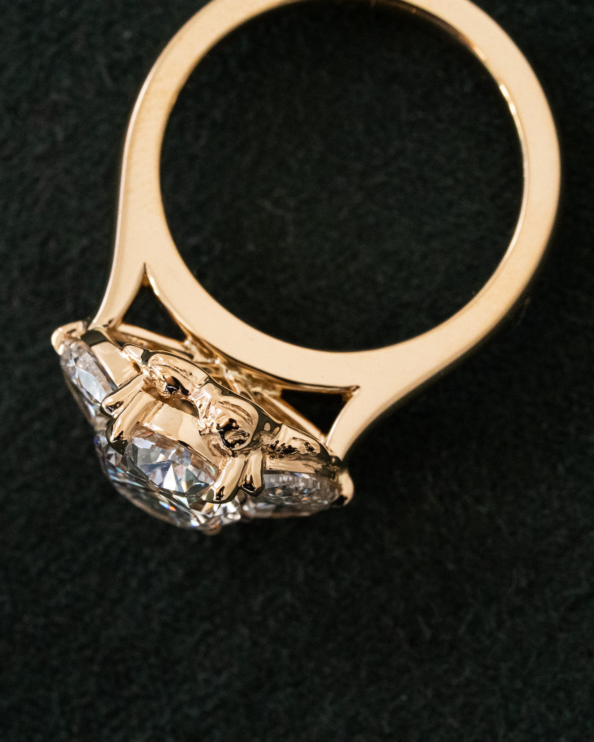Oval diamond with half moon trilogy