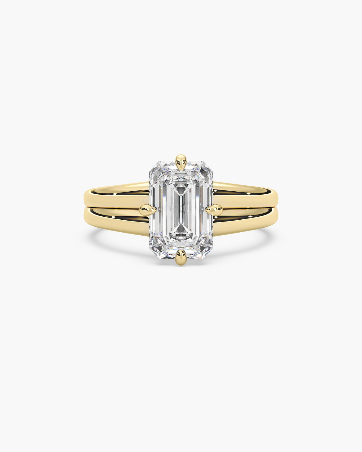 Sen Ribbed emerald cut solitaire engagement ring in 18k yellow gold, top view